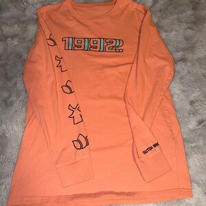 Dutch Bros Orange Long Sleeve Tee with Graphic Design